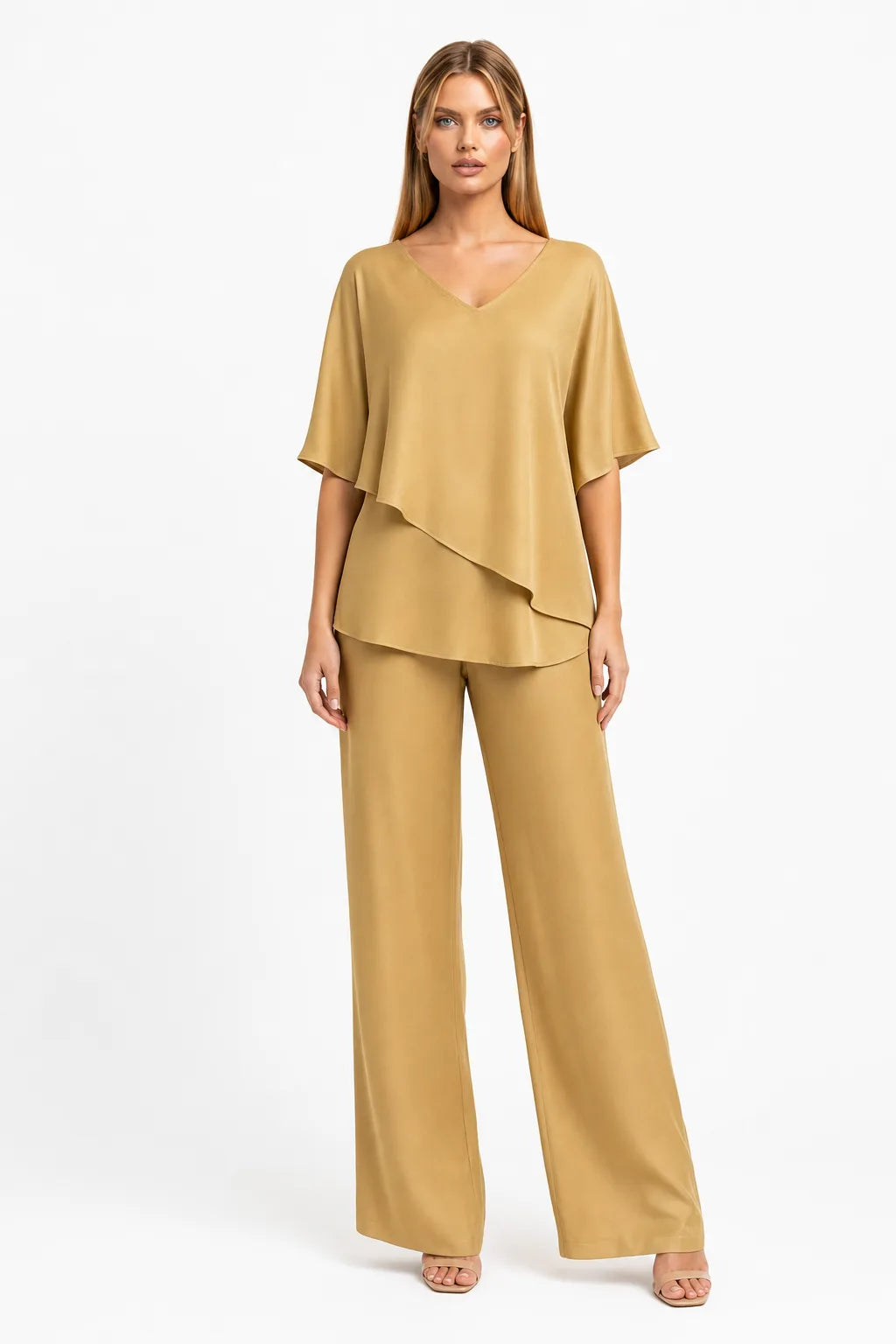 Gold flutter sleeve matching trouser set on model in contrapposto stance
