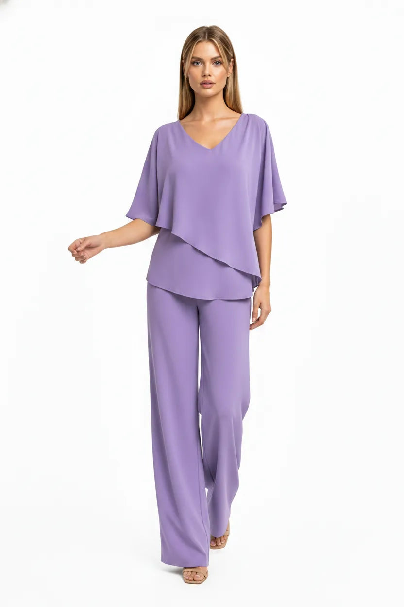 Purple flutter sleeve matching trouser set on model in natural movement