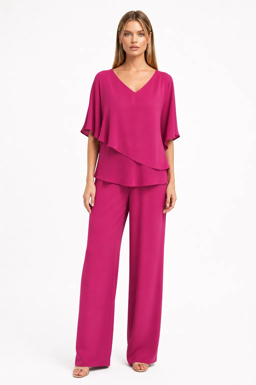Rose red flutter sleeve matching trouser set on model in contrapposto stance