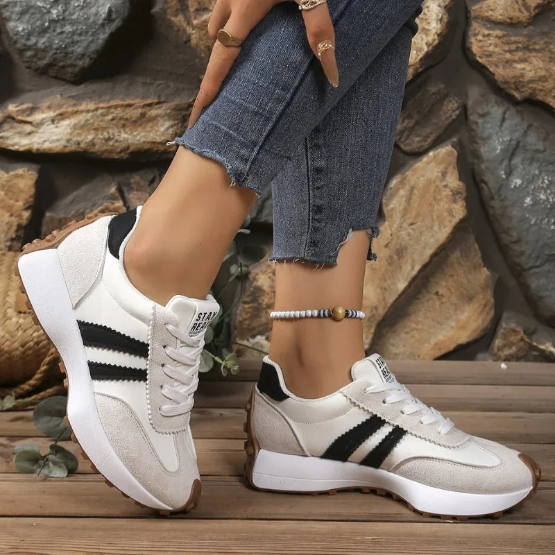 White retro chunky sneaker, close-up detail view