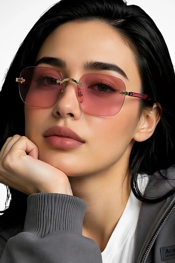 Square rimless sunglasses with rose pink gradient lenses, front view