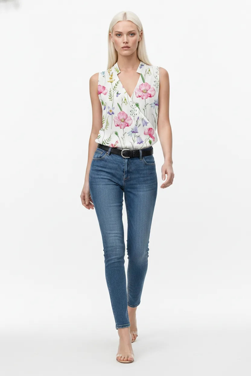 White collared wrap blouse on model in natural movement pose