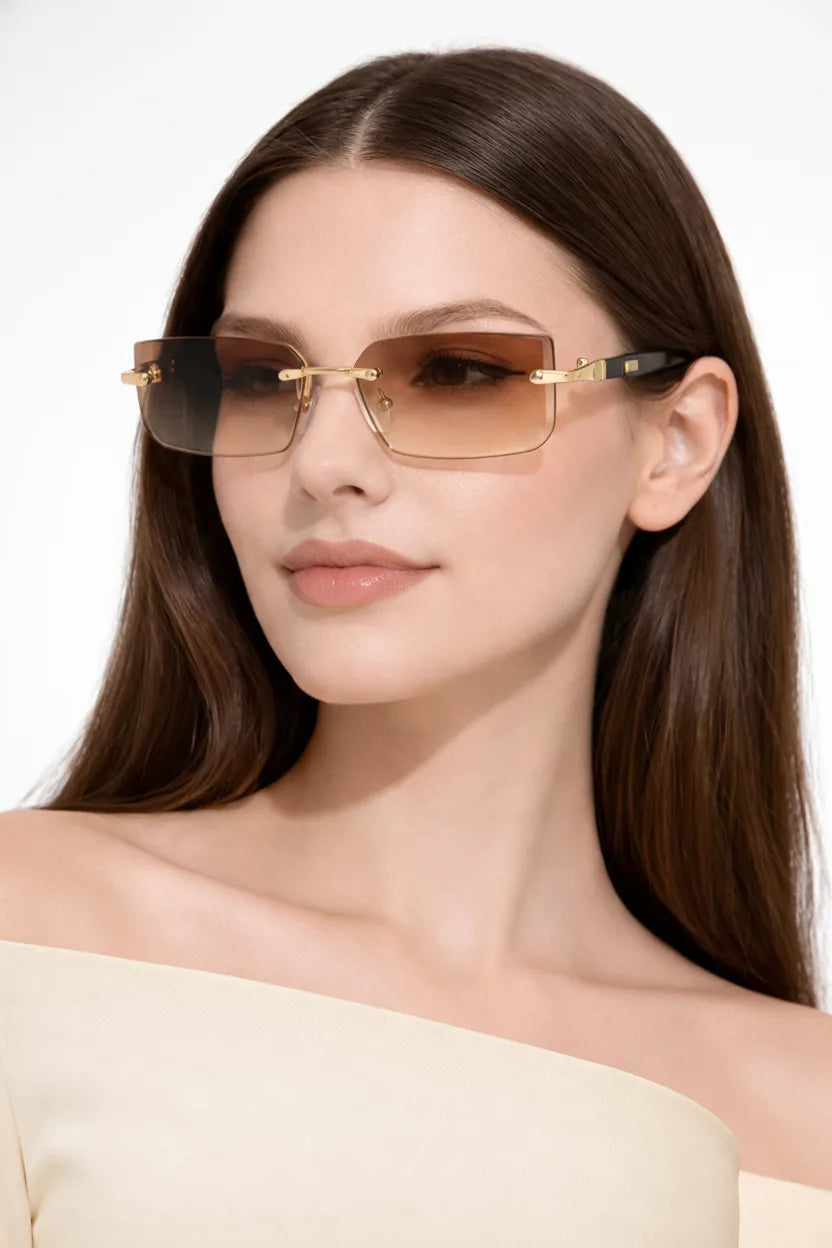 Rimless rectangle gradient sunglasses in champagne worn on a model&