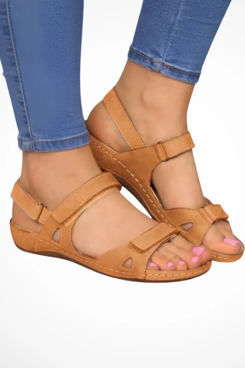 Brown leather sandal with velcro strap closure, front view