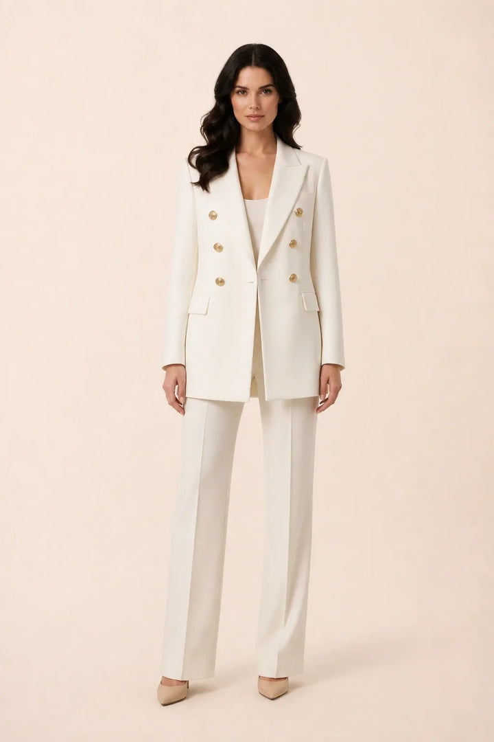 White double-breasted blazer on model in contrapposto stance