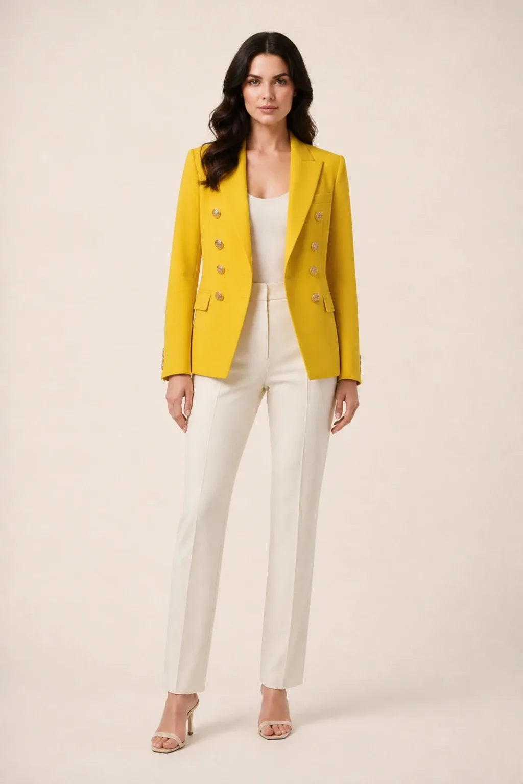 Yellow double-breasted blazer on model in contrapposto stance