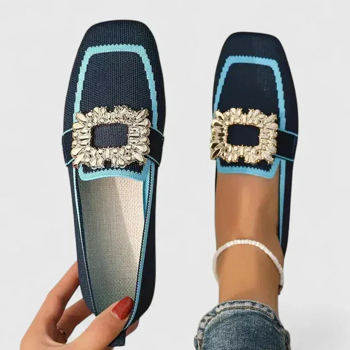 Blue loafer with crystal buckle detail, front view