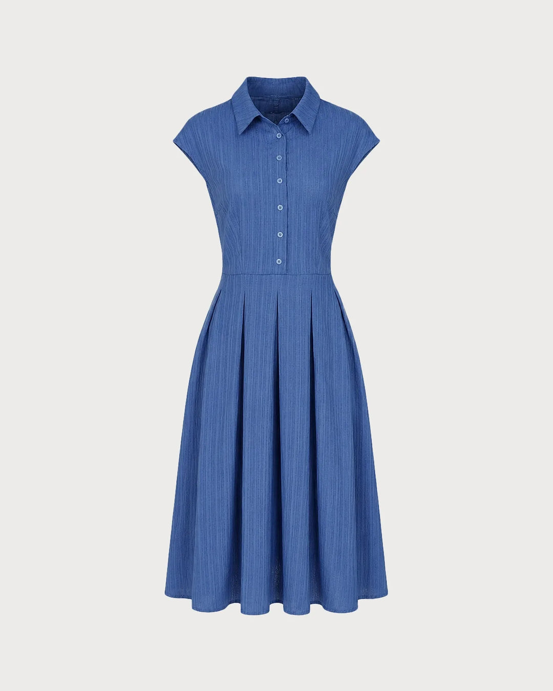 Model wearing a blue pleated midi dress with focus on the full-length fit