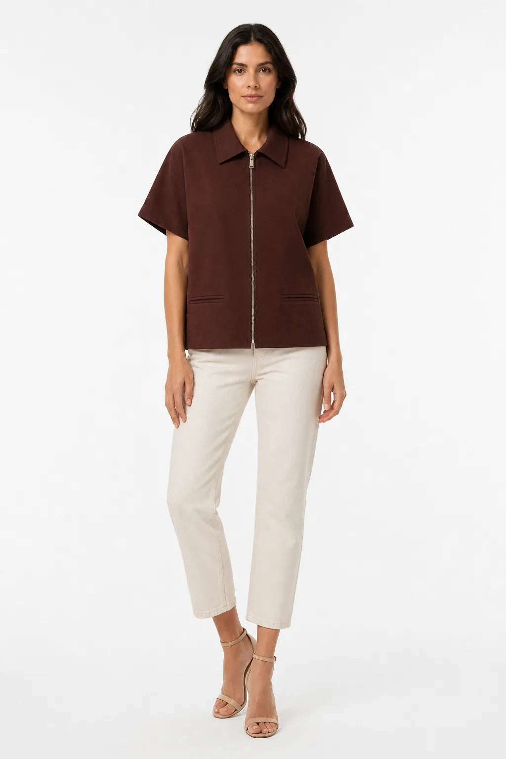 Brown zip-front jacket on model in contrapposto stance