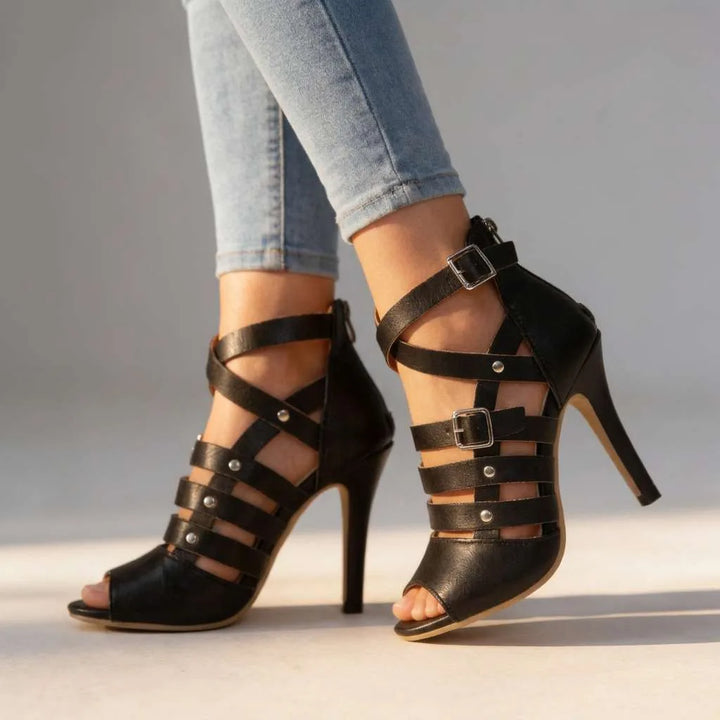 Black gladiator stiletto sandal with strappy lace-up design, front view