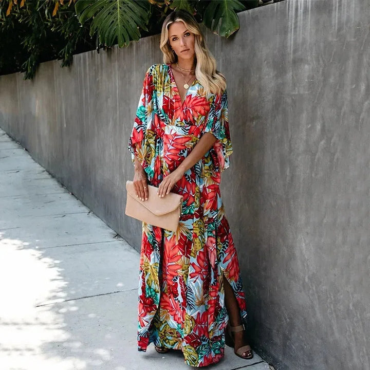 Red tropical-print wrap maxi dress on model, alternate styling view