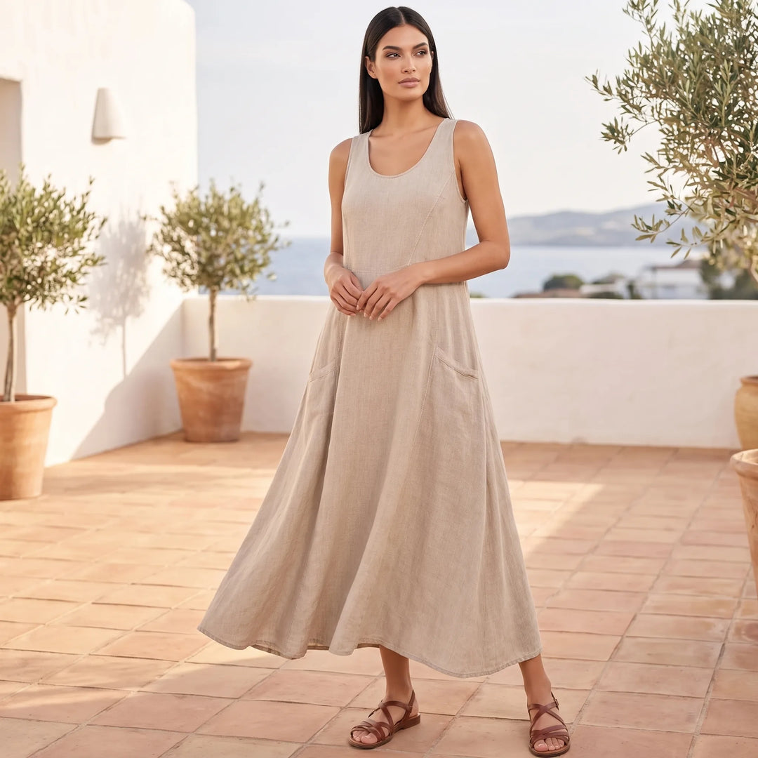 Model wearing khaki maxi dress in a relaxed lifestyle setting