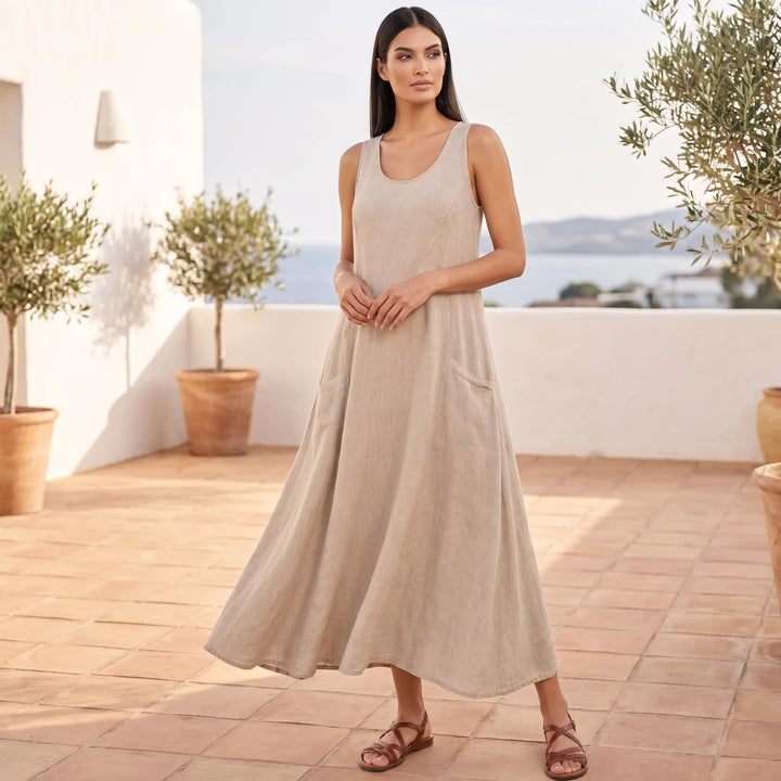 Model wearing khaki maxi dress in a relaxed lifestyle setting