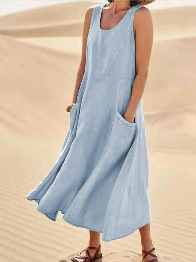 Light blue maxi dress with side pockets, full-length front view