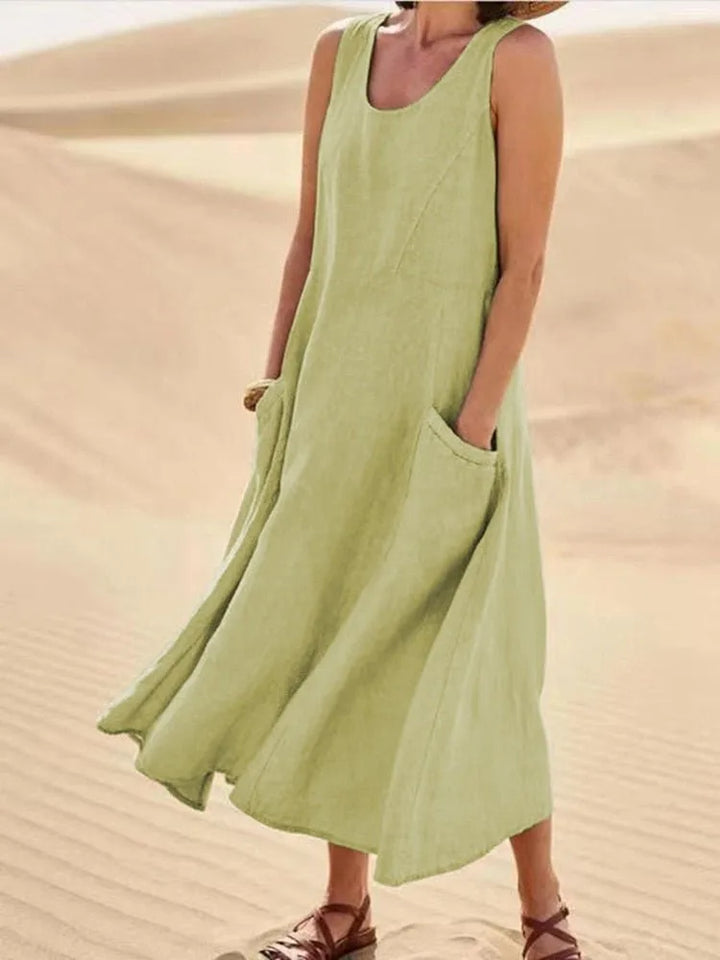 Light green maxi dress with side pockets, full-length back view
