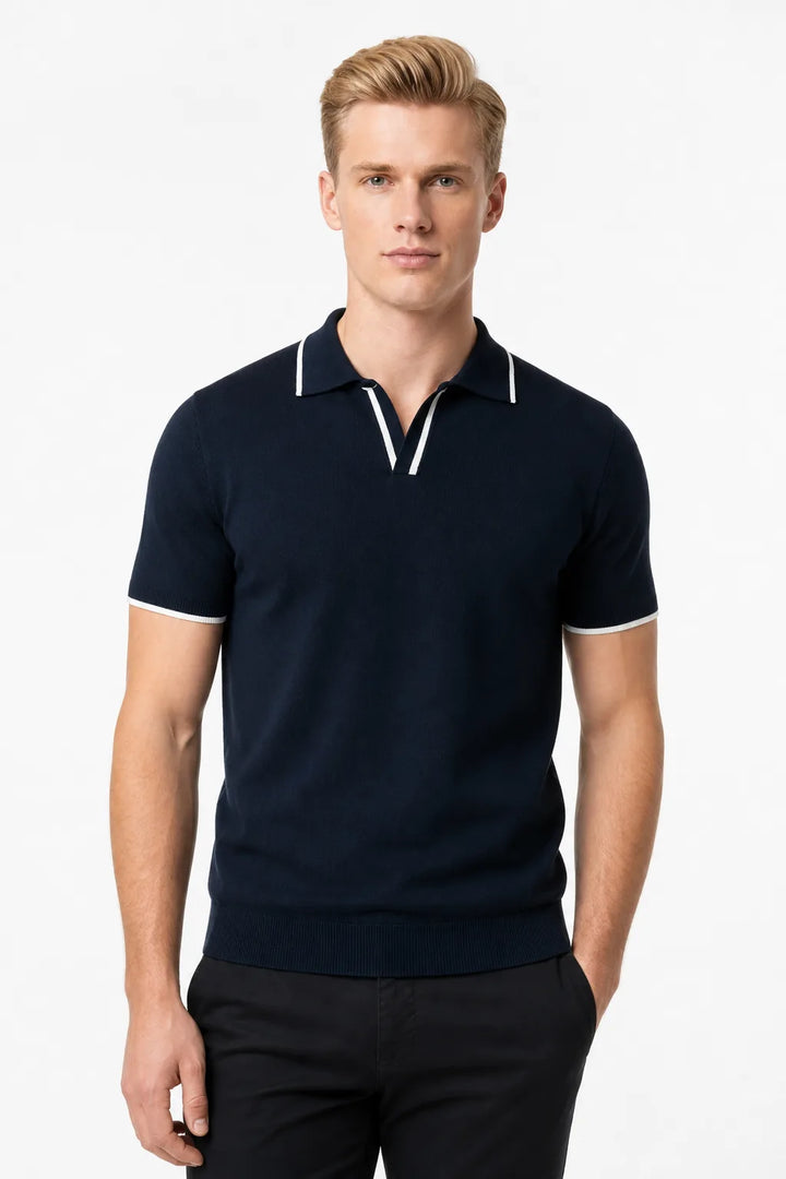 Navy blue knit polo with contrast trim, model in contrapposto stance