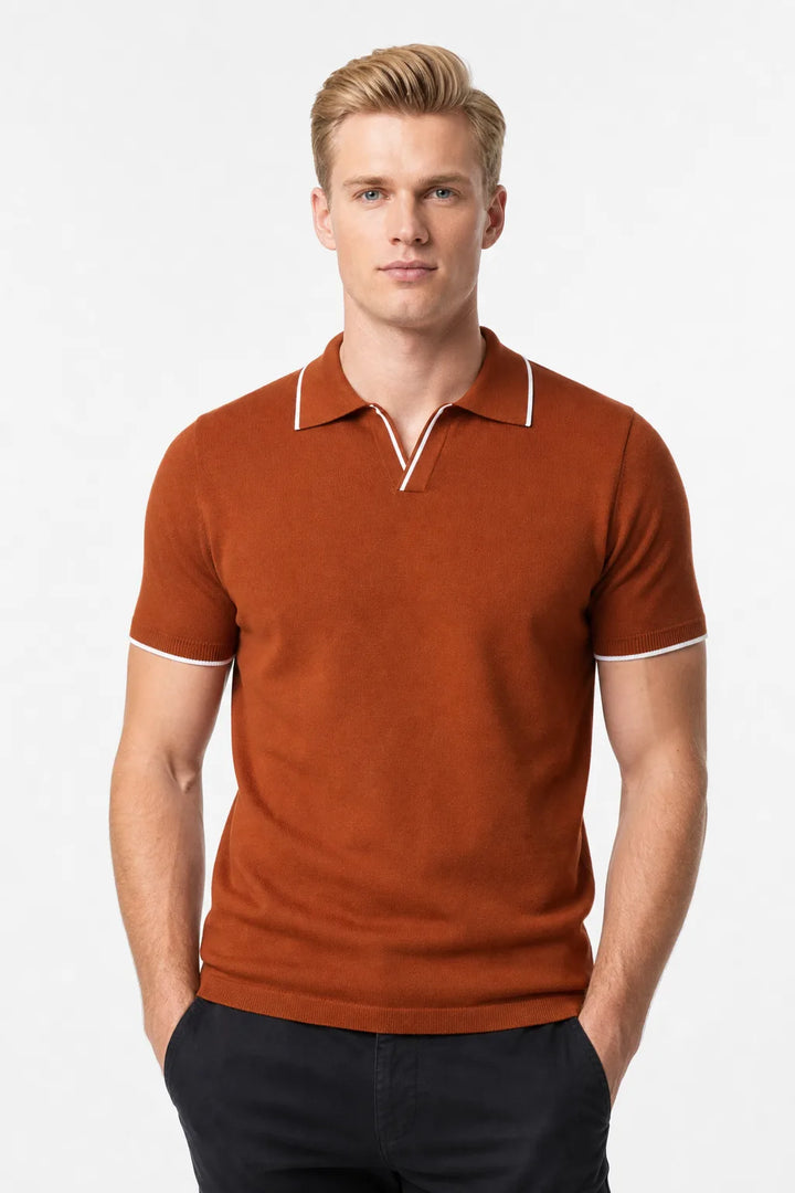 Rust knit polo with contrast trim, model in contrapposto stance