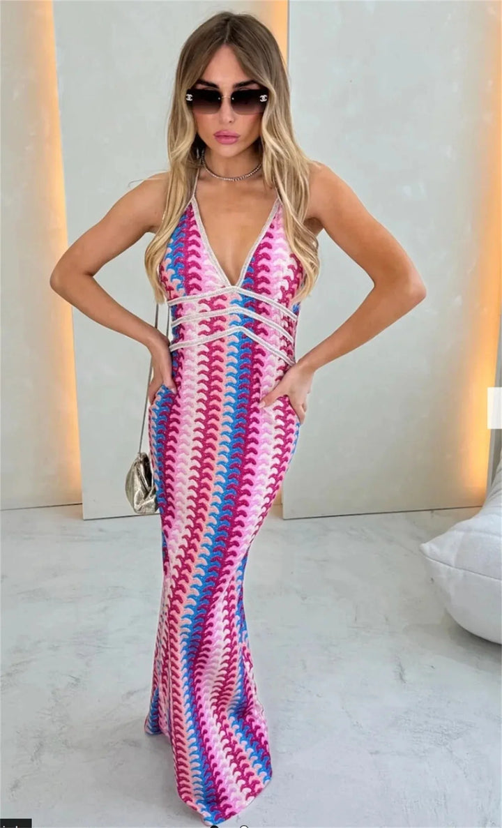 Woman in a beige multicolor crochet halter maxi dress, styled full-length view