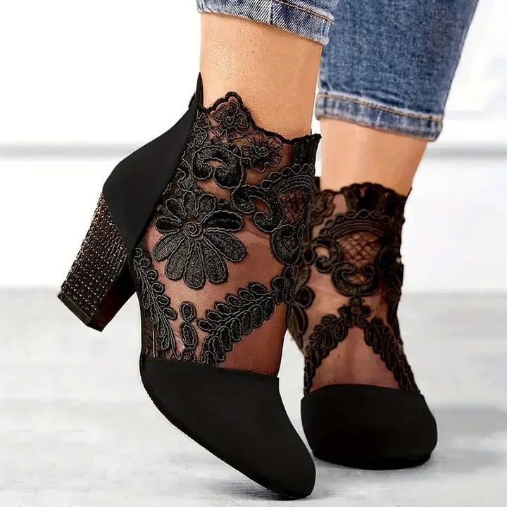 Black lace overlay ankle boot, three-quarter view