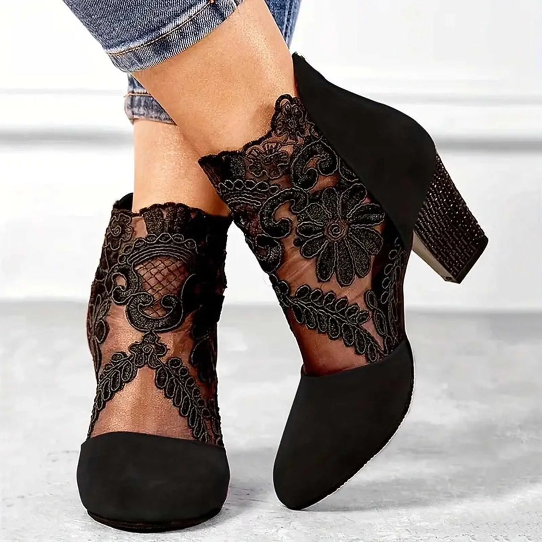 Red lace overlay ankle boot, heel view