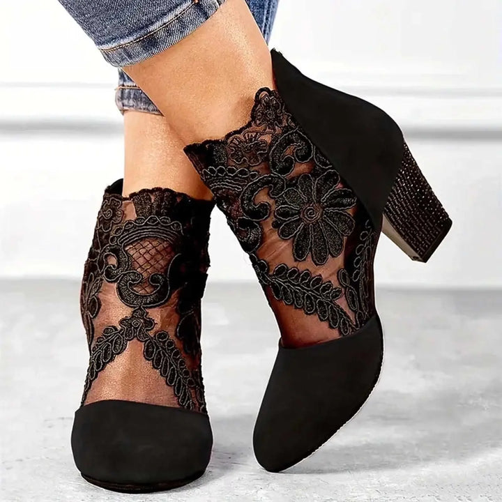 Red lace overlay ankle boot, heel view