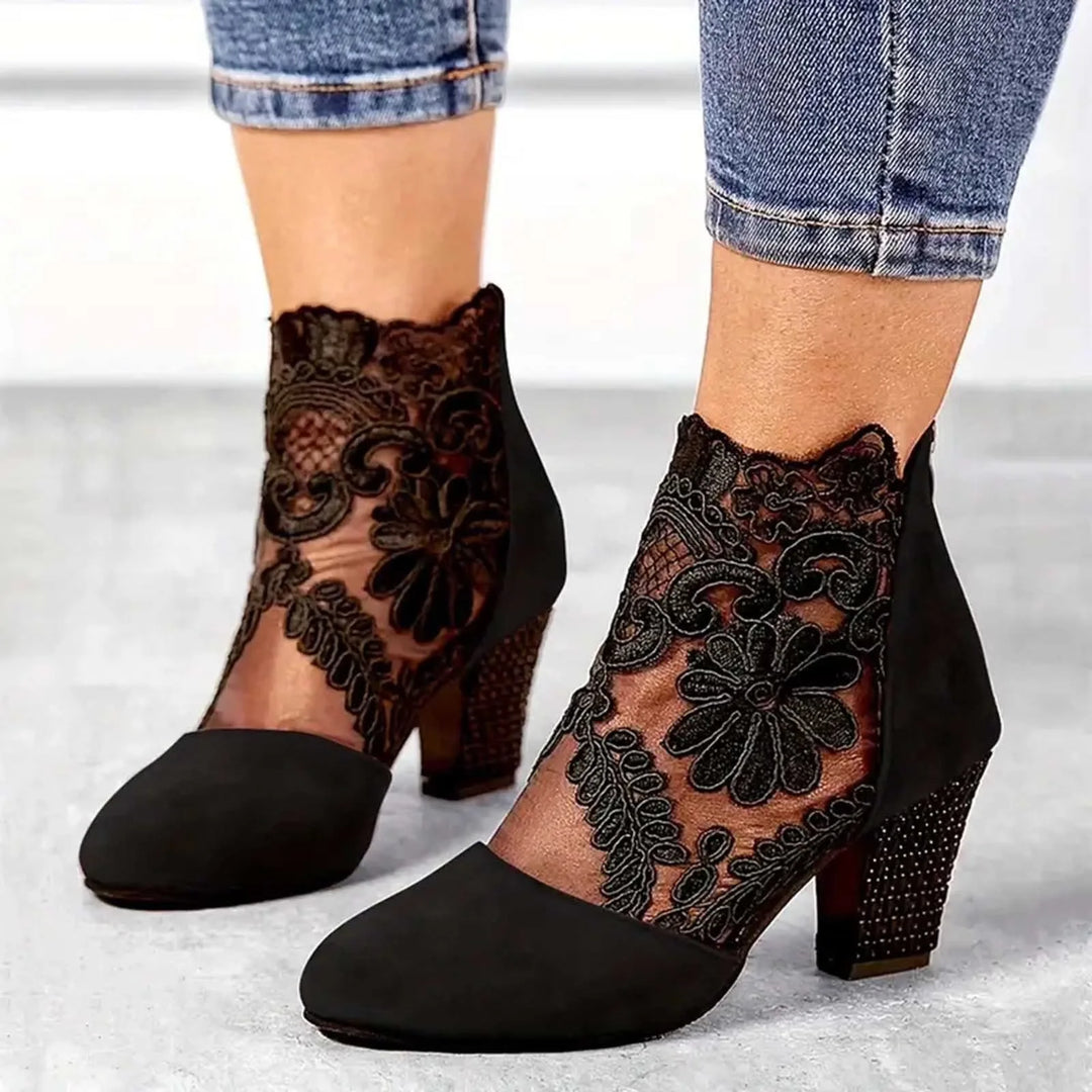 Red lace overlay ankle boot, close-up detail view