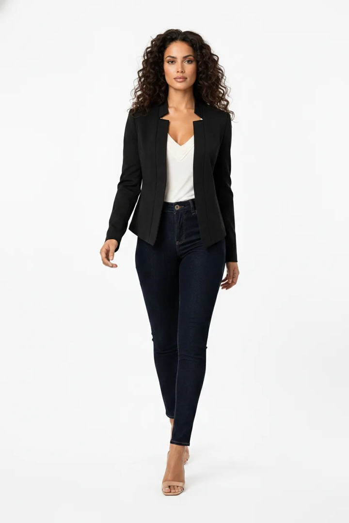 Black collarless open-front blazer on a model in natural movement