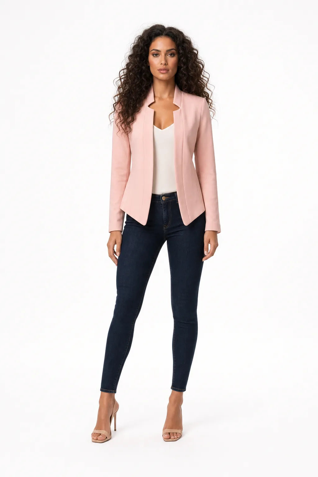 Pink collarless open-front blazer on a model in a contrapposto stance
