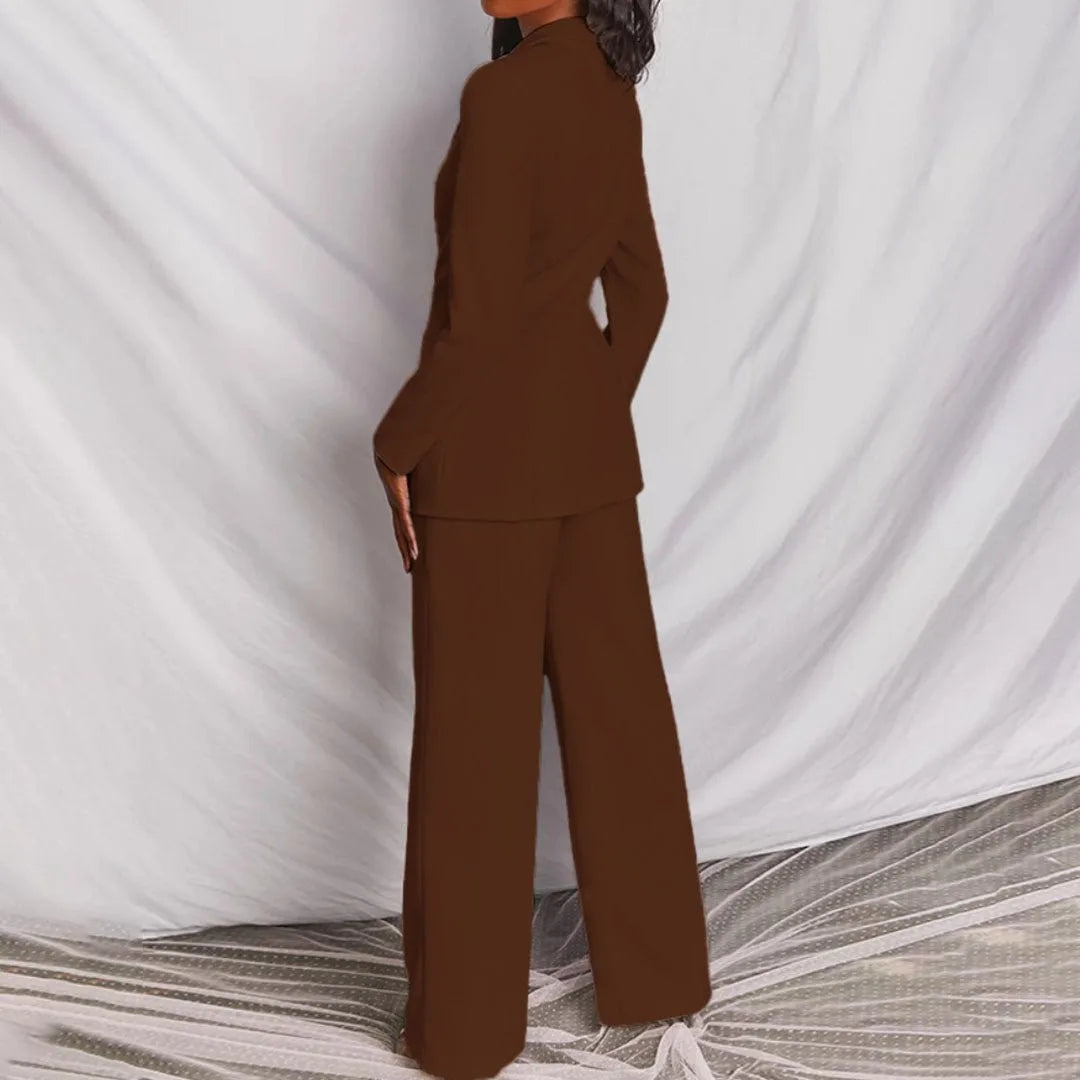 Woman in a yellow tailored blazer suit set, fashion forward stance