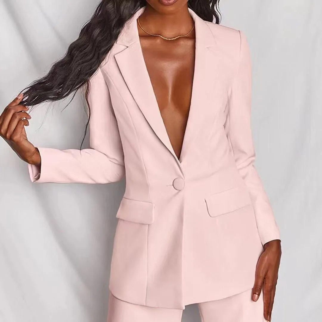 Woman showcasing a yellow tailored blazer suit set from a relaxed angle