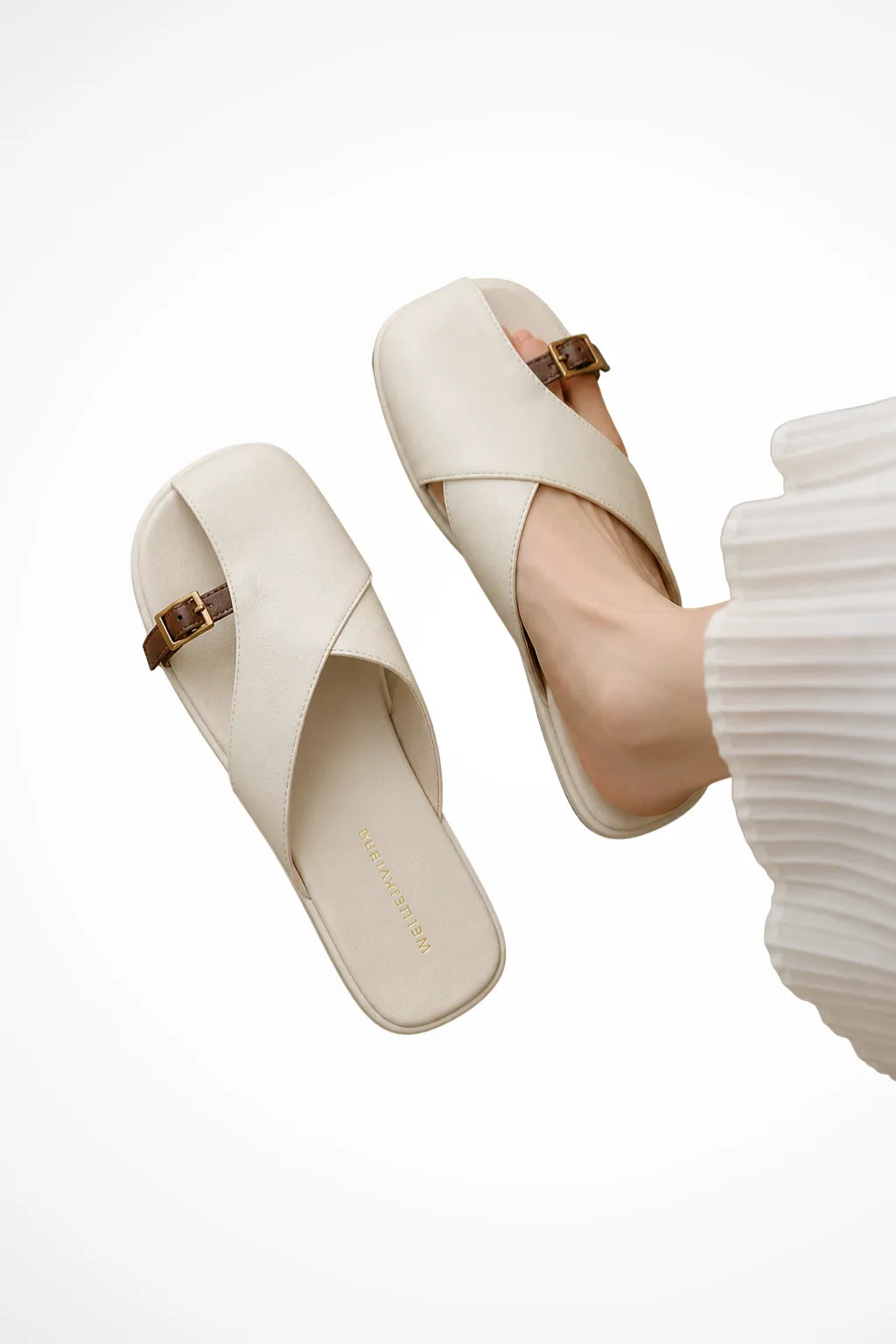 Ivory cross strap square toe mule, front view