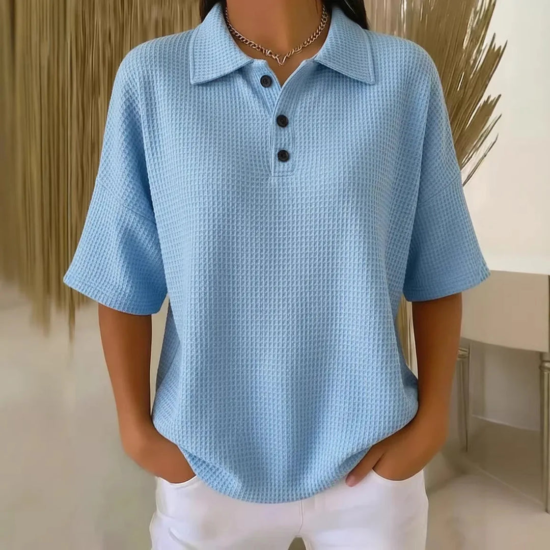 Red waffle knit polo top on model, styled view