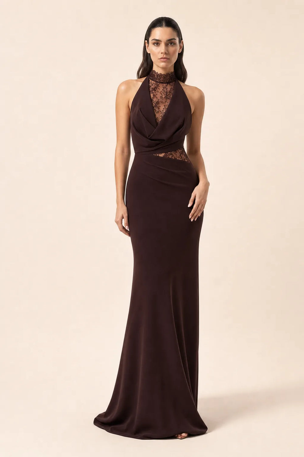 Red brown lace panel halter gown on model in contrapposto stance