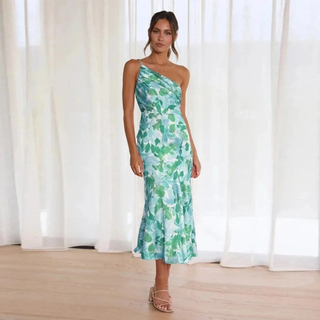 Model wearing a blue floral one-shoulder midi dress