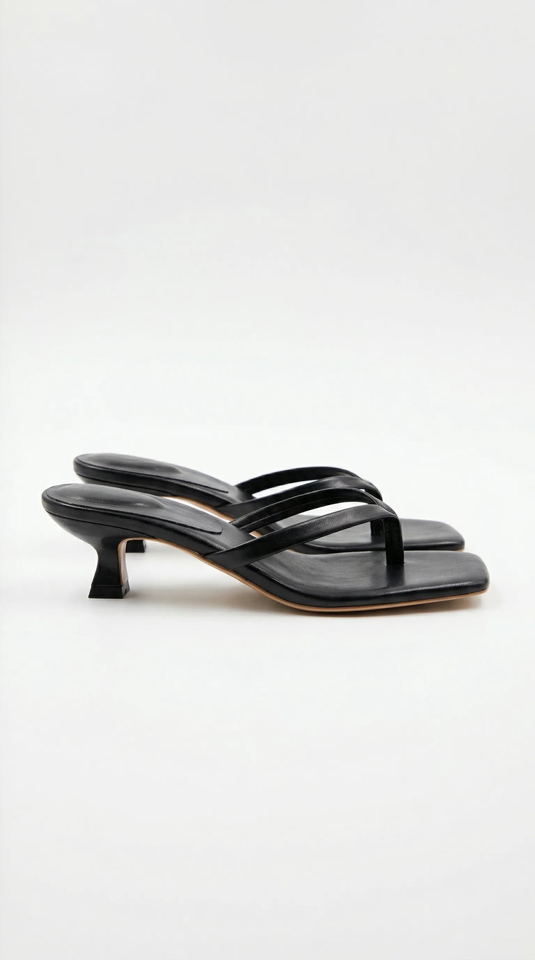 Black kitten heel thong mule, front view