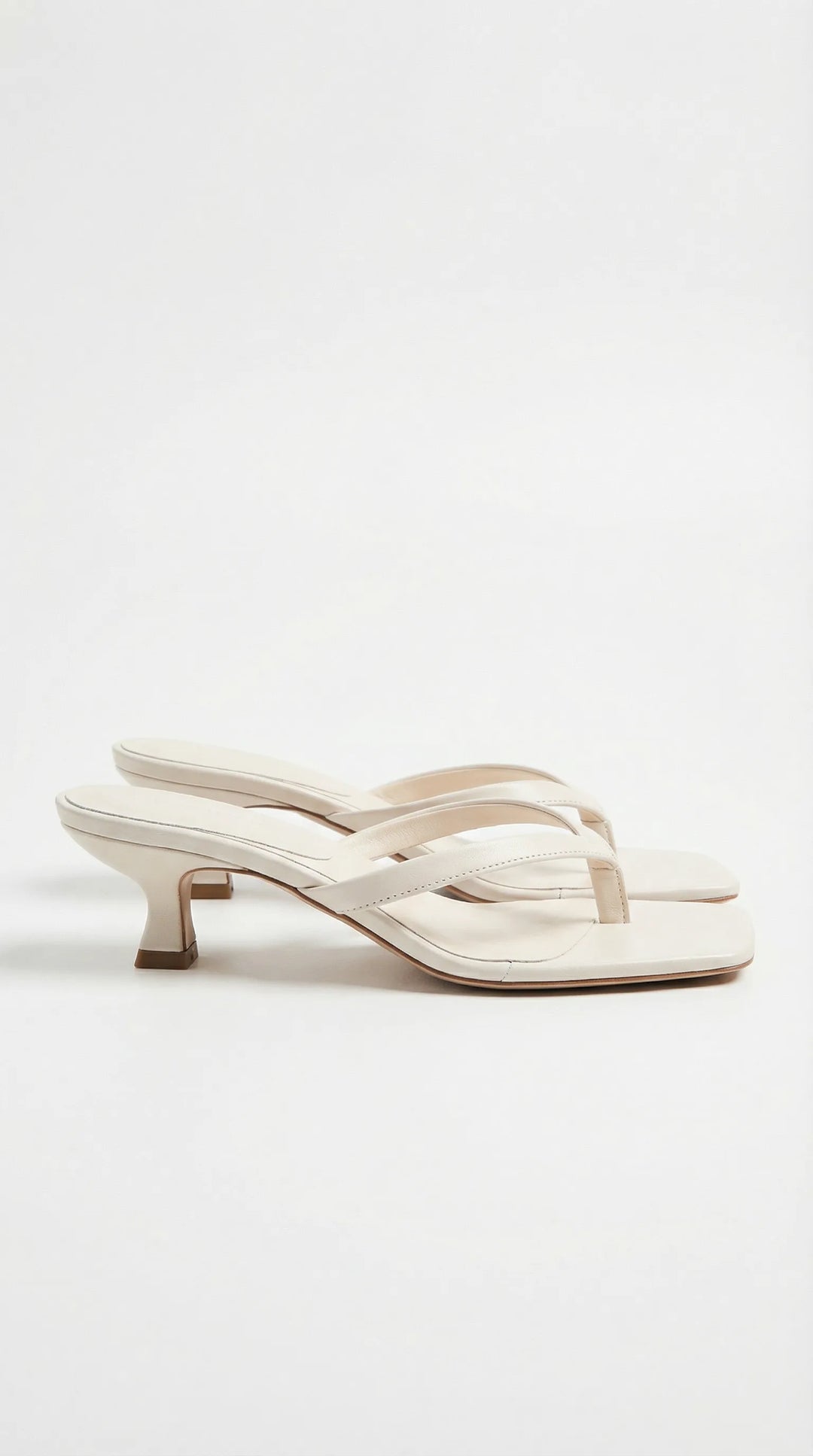 Light brown kitten heel thong mule, front view