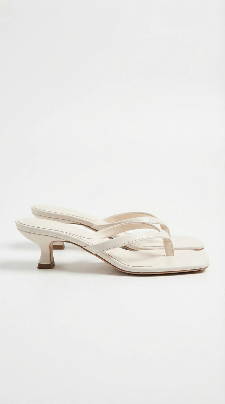 Light brown kitten heel thong mule, front view