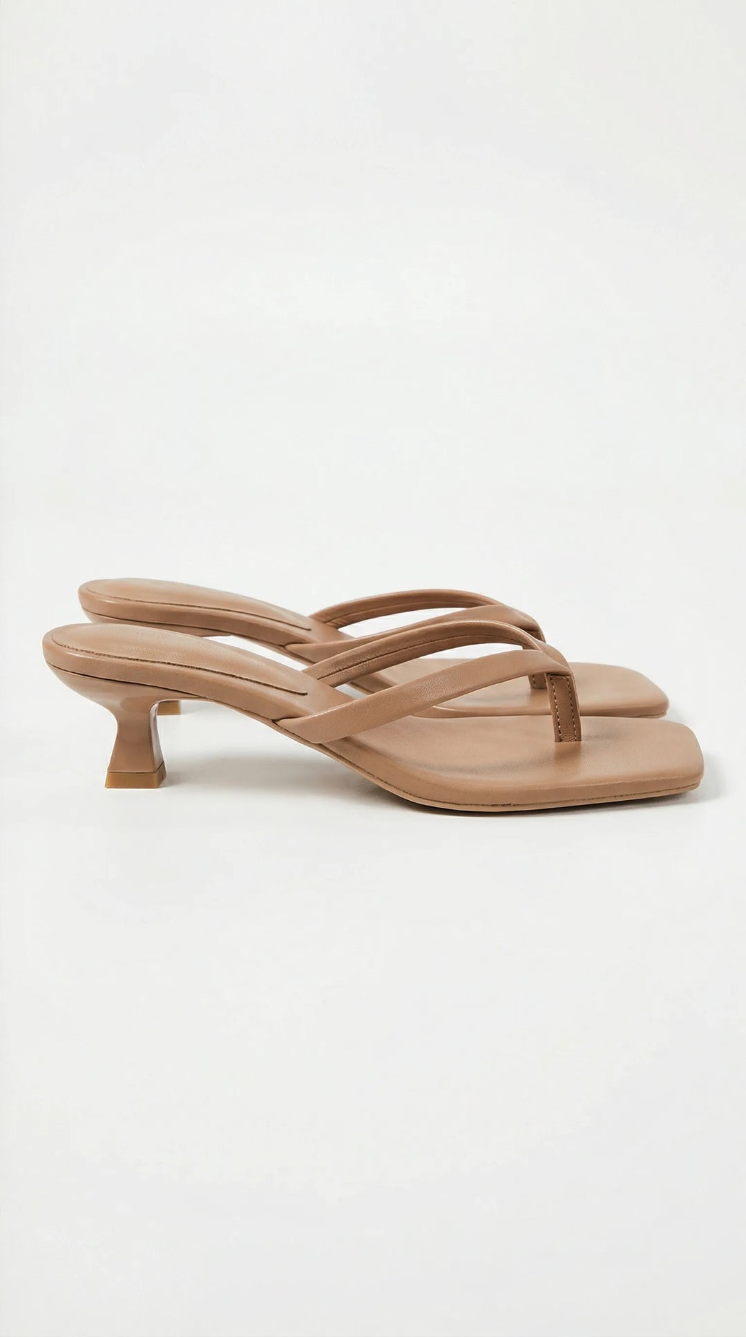 Tan kitten heel thong mule, front view