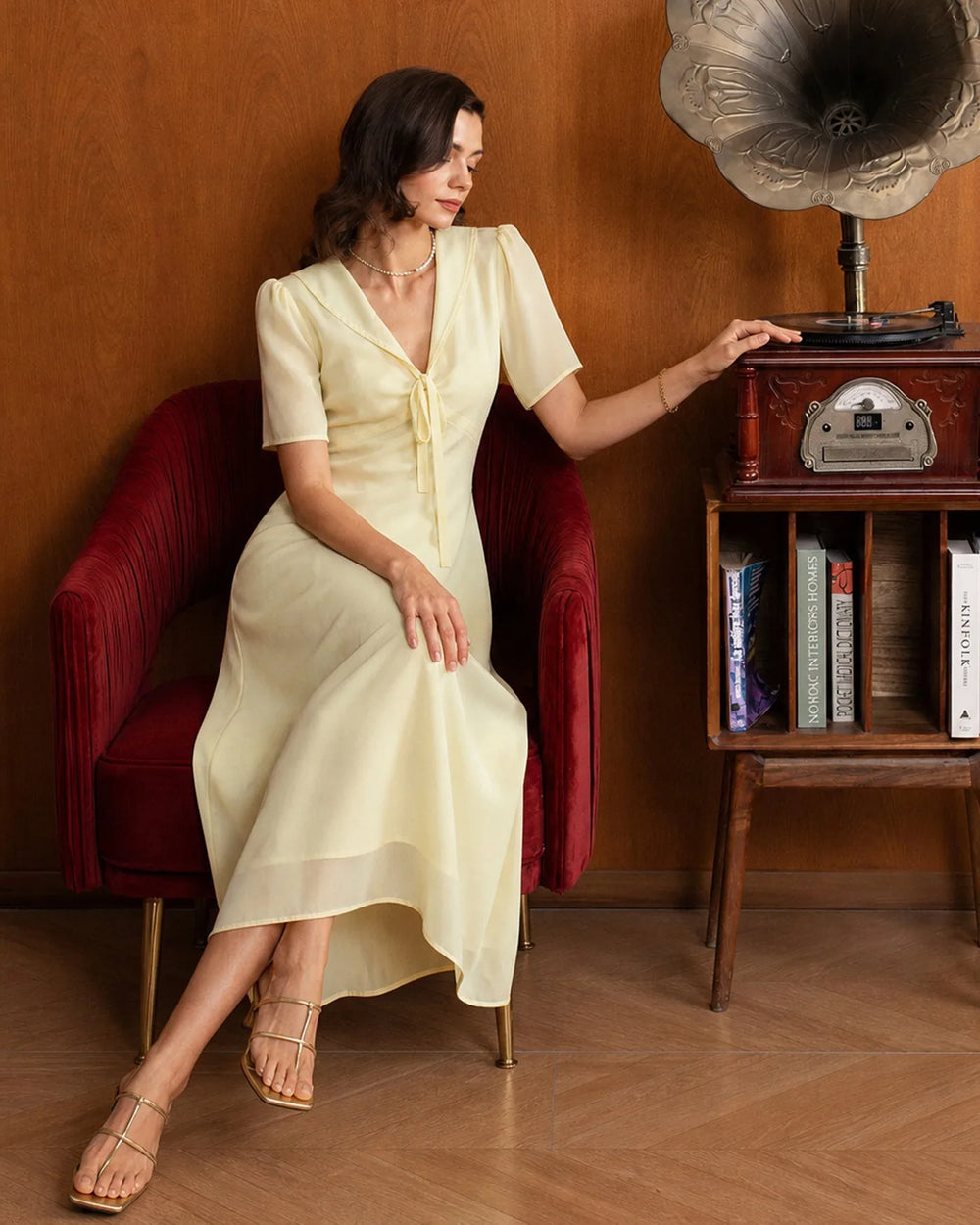 Close-up detail of sailor collar on yellow midi dress