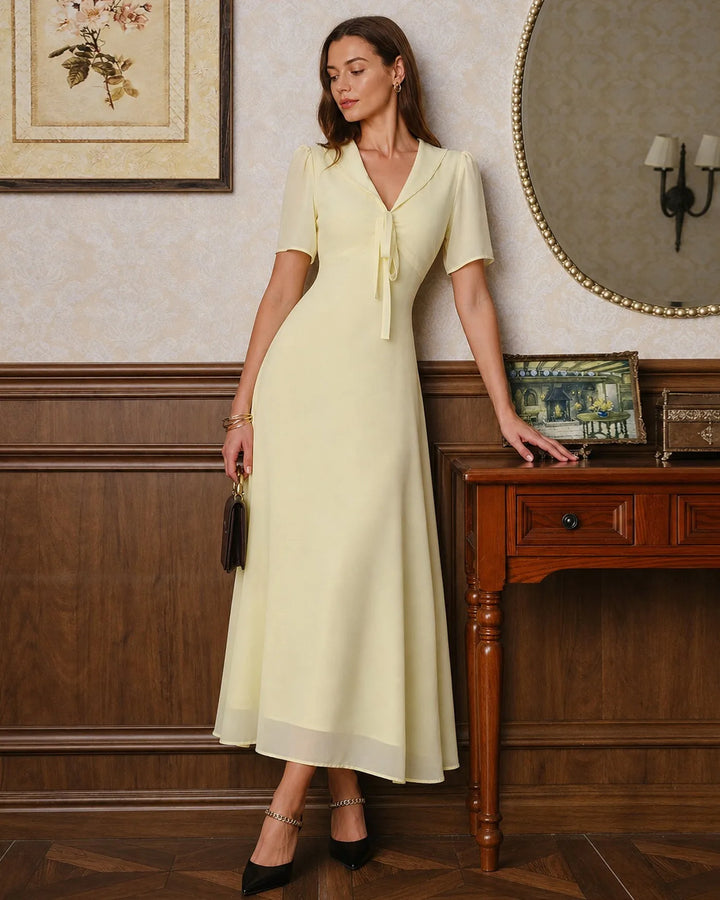 Yellow sailor collar midi dress, model at three-quarter turn