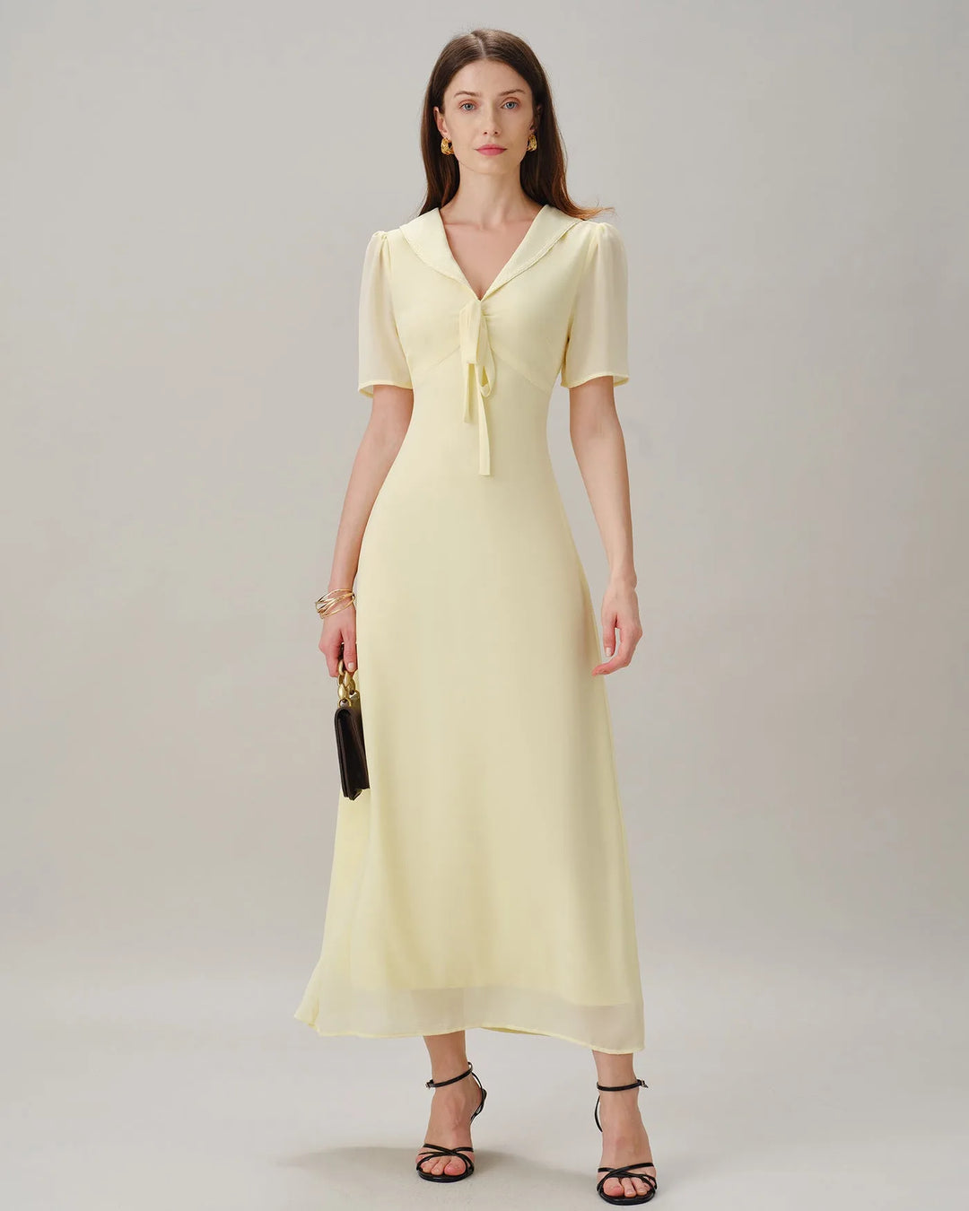 Yellow sailor collar midi dress, model in alternative pose
