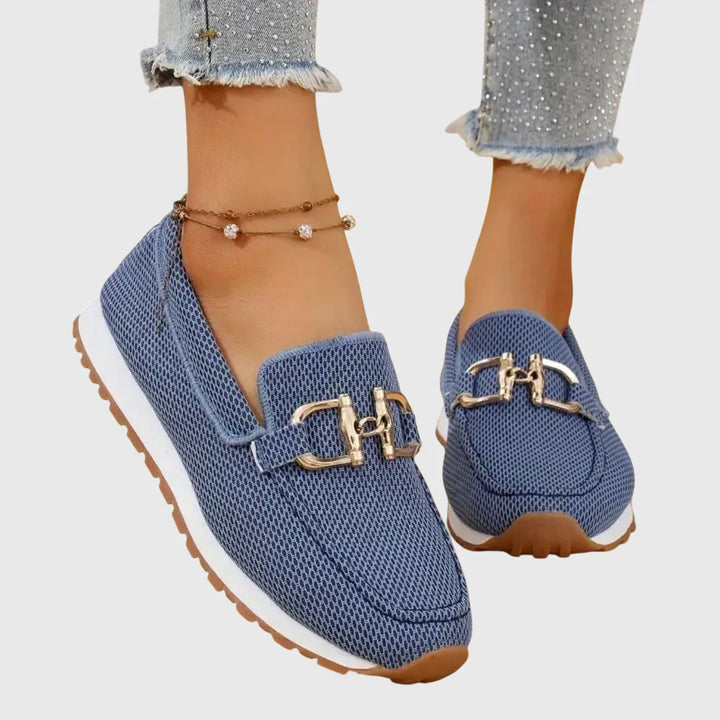 Blue platform loafer with gold horsebit detail, front view