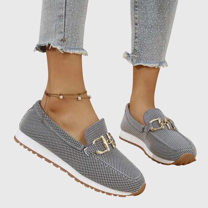 Gray platform loafer with gold horsebit detail, front view