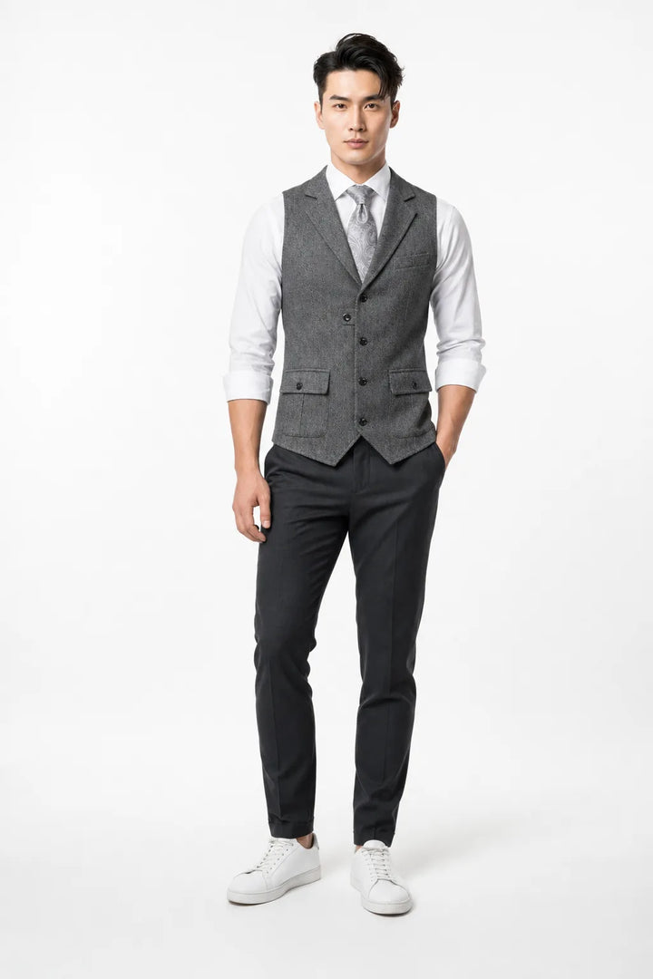 Dark gray notch lapel waistcoat on a model in a contrapposto stance