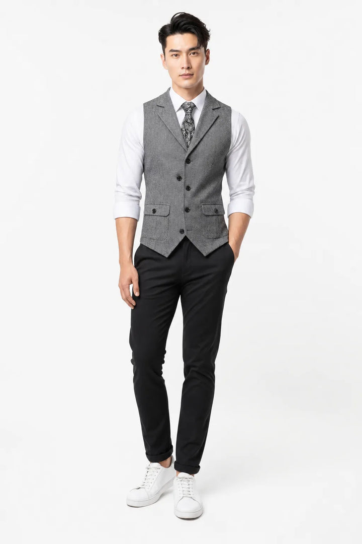 Light gray notch lapel waistcoat on a model in a contrapposto stance