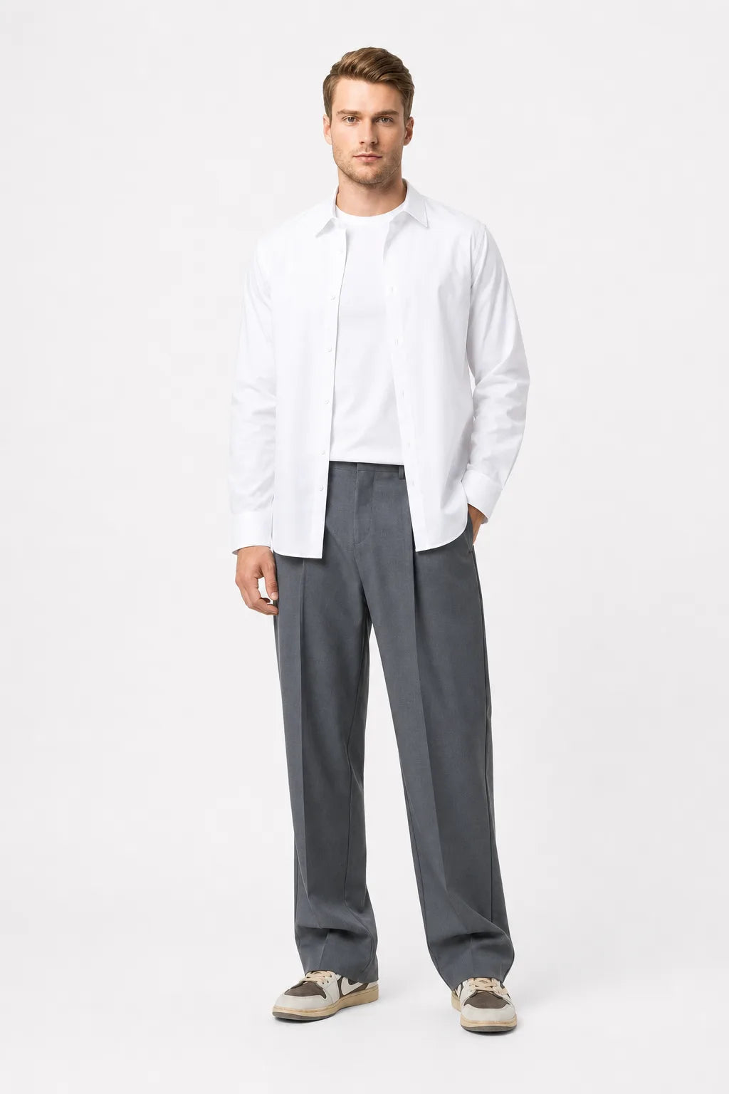 Grey pleated wide-leg trousers on a model in a contrapposto stance