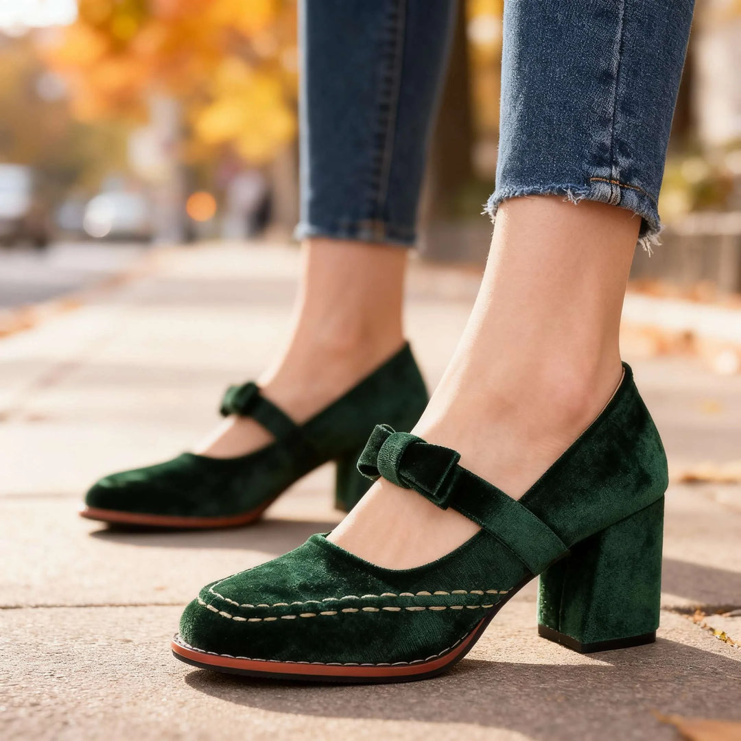 Green velvet Mary Jane pump with bow detail, side profile view