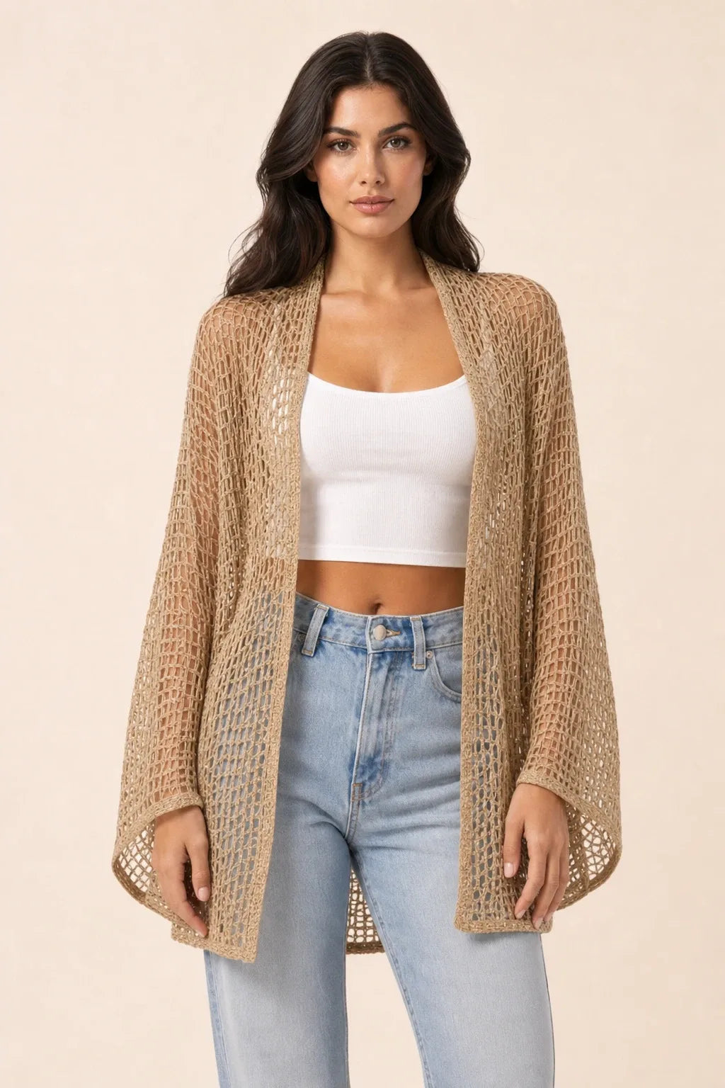 Khaki net knit open-weave cardigan on model in contrapposto stance