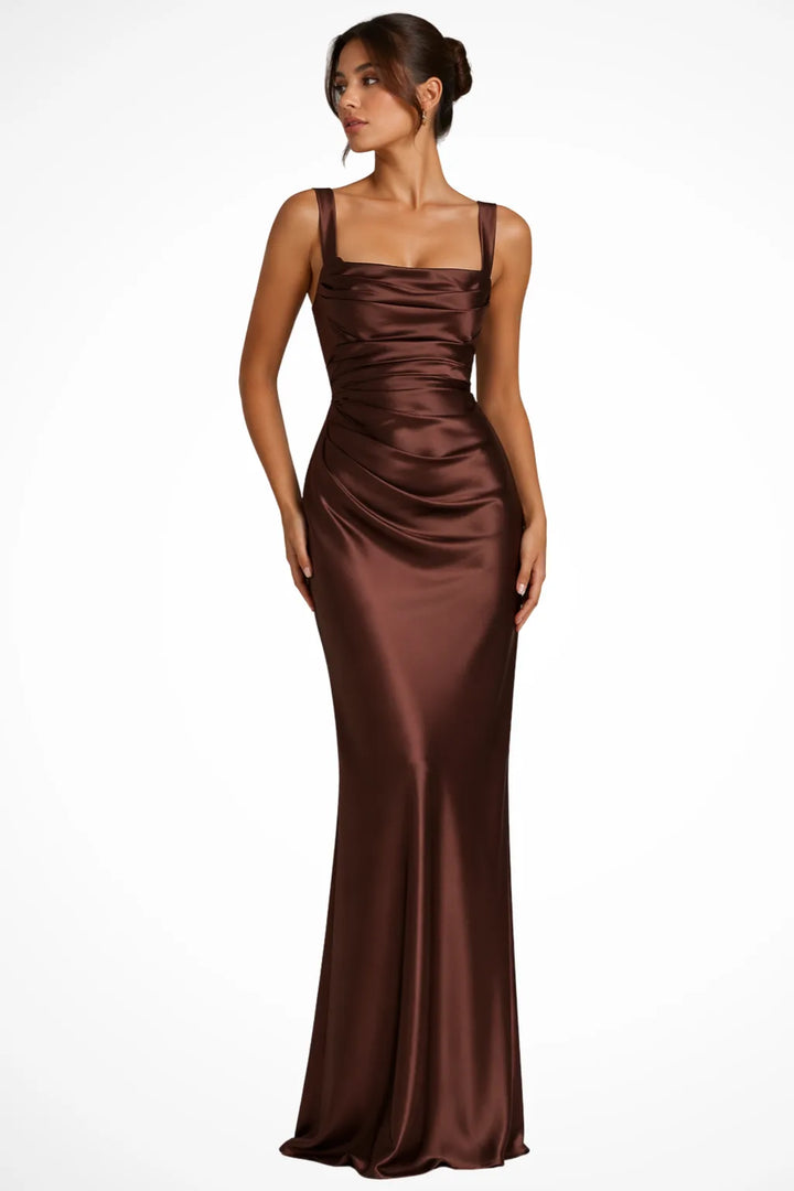 Brown corset lace-up gown on a model in a side pose