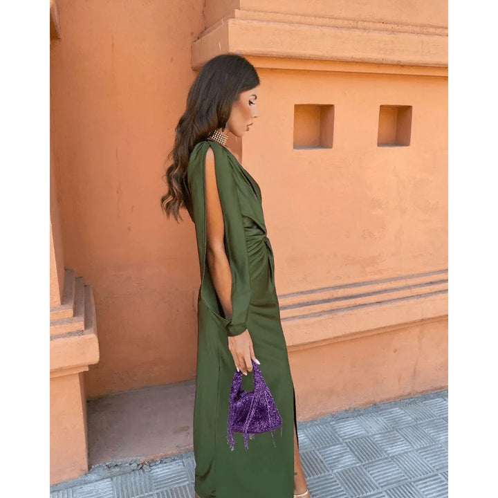 Close-up detail of the twist knot and one-shoulder neckline on an olive green maxi dress